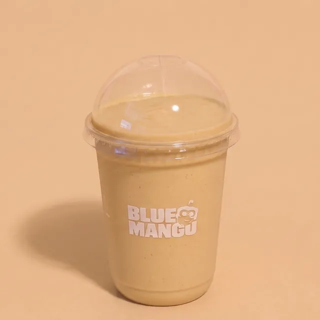 Caramel protein shake in a Blue Mango cup